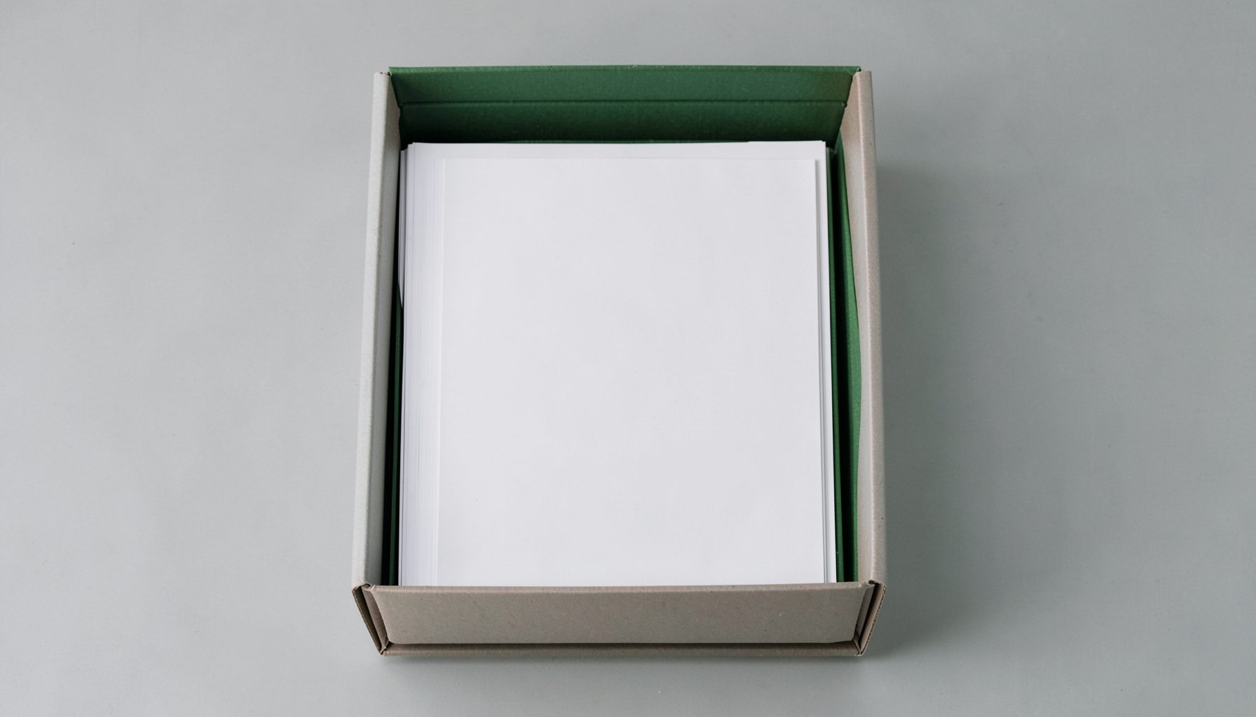 Multiple flyer sets packed neatly into plain white and light gray boxes, clean and unmarked packaging.
